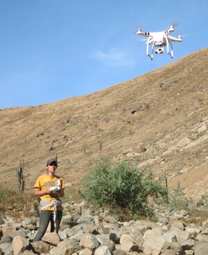 photo of Kasia Kasia Szremski flying a drone at field school in Peru